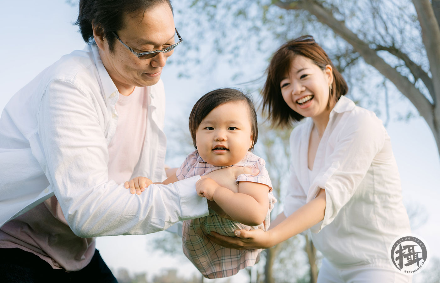 Lifestyle family photography in Laguna Beach, showcasing playful interactions and natural laughter in a stunning location.