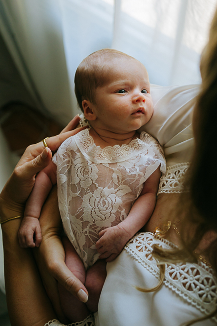 Tender in-home newborn photoshoot in Los Angeles, capturing precious first moments with baby and parents by California’s best newborn photographer.