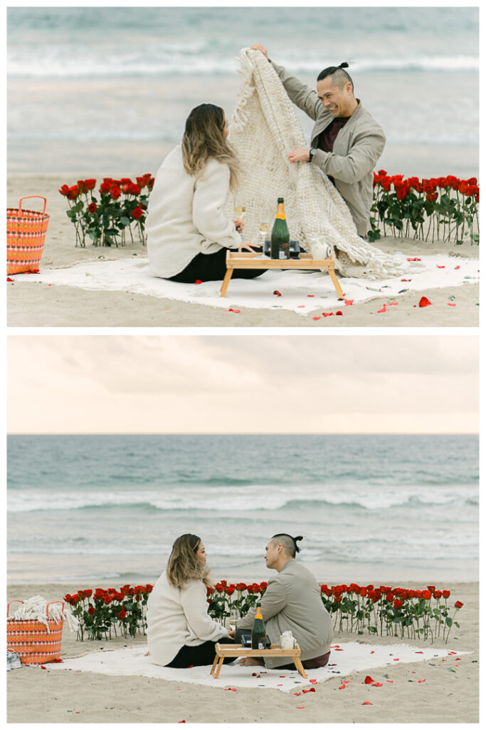 Romantic DIY beach proposal setup with red roses at Venice Beach, California.