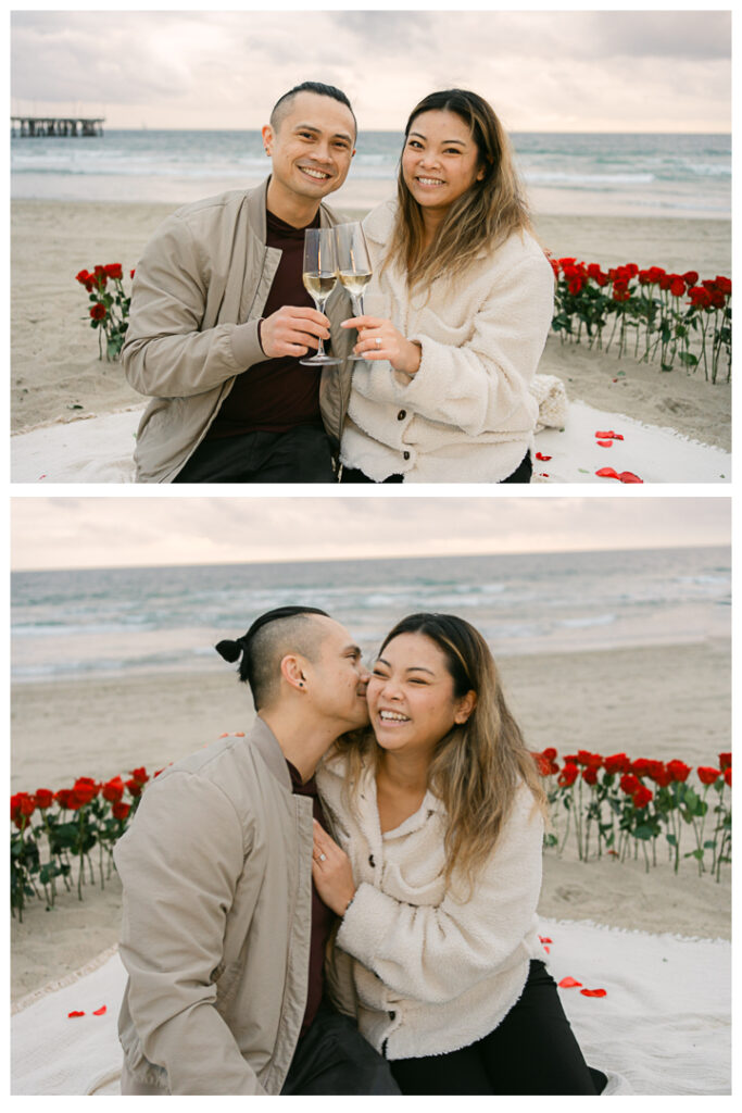 Romantic DIY beach proposal setup with red roses at Venice Beach, California.