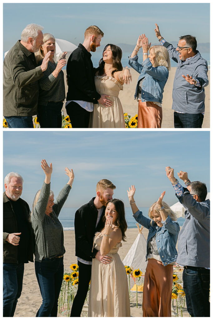 A couple embraces at their beach picnic proposal in Hermosa Beach, Los Angeles.