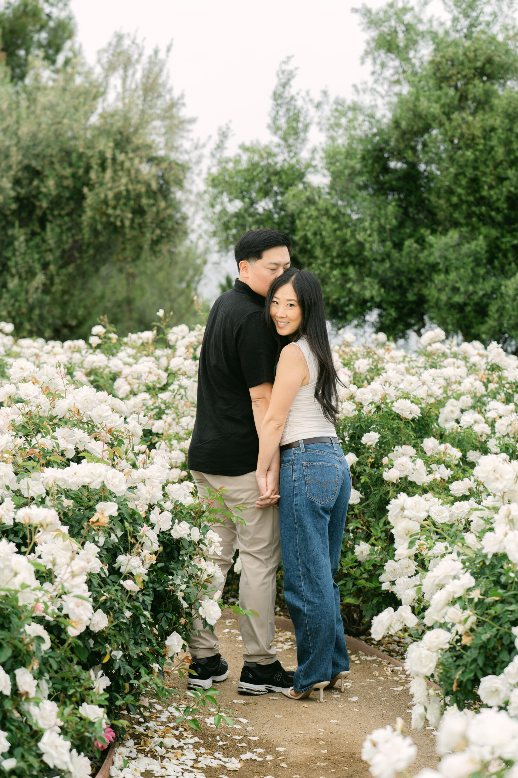 Daniel proposes to Christina at Stonewall Ranch Malibu in a quiet, overcast moment with floral decor and mountain views.