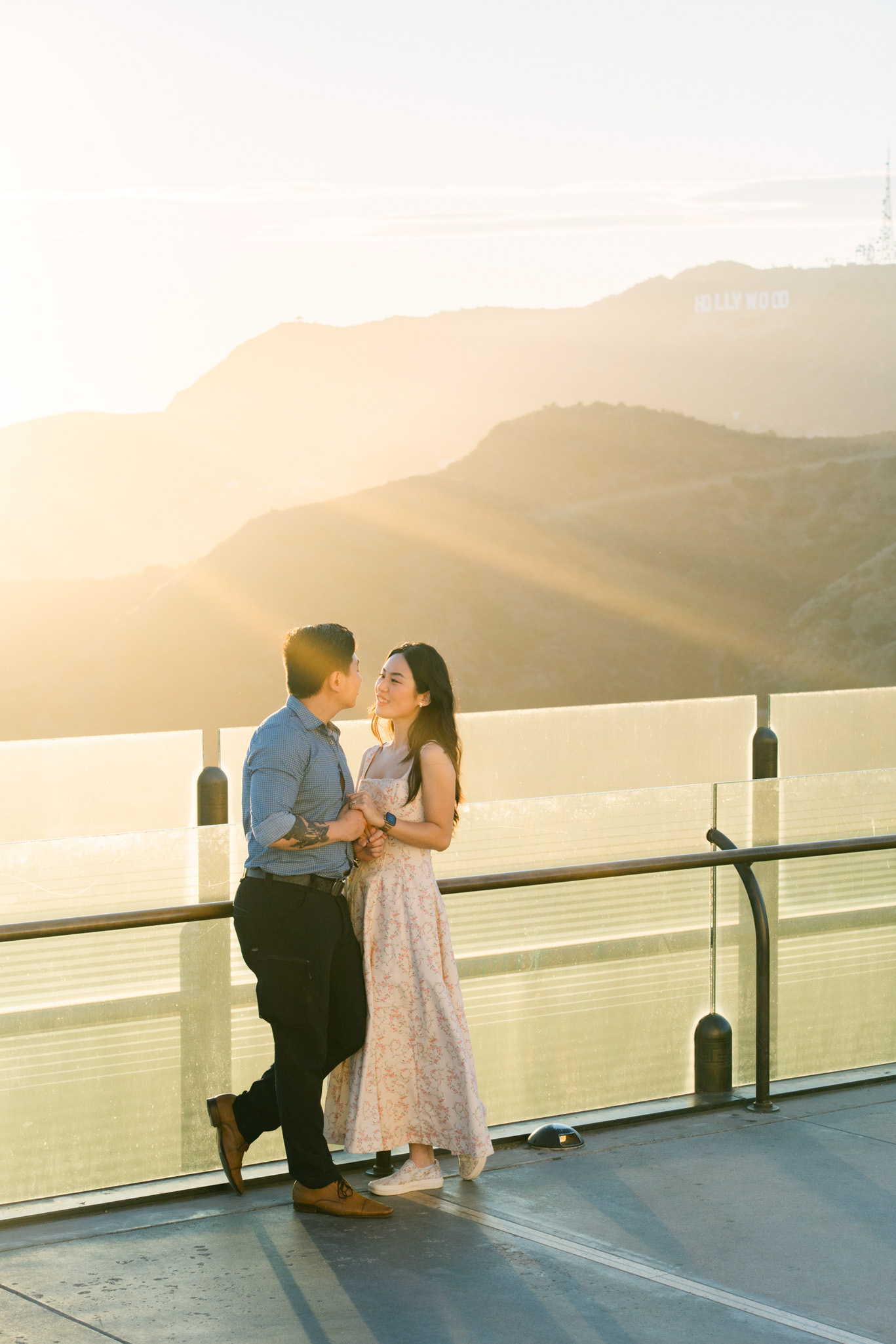 Romantic Griffith Observatory proposal photos with Hollywood Sign backdrop